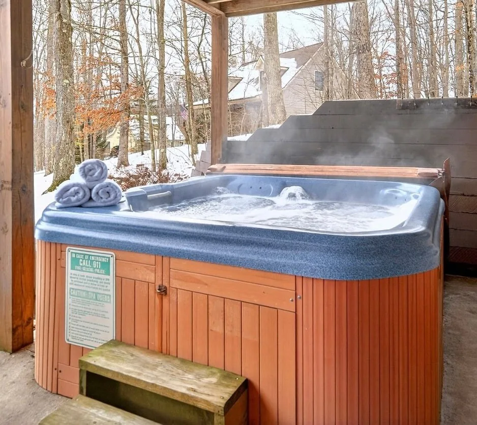 Hot tub steaming on the covered porch